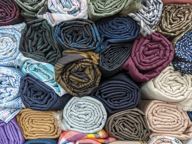 Make synthetic fabrics biodegrade to cut textile waste